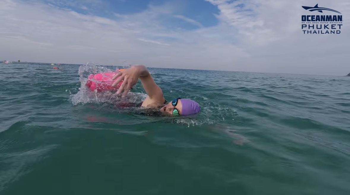 Flora Muijzer swimming freestyle in open water during the OceanMan 5km race in Phuket, Thailand